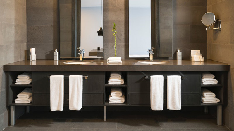 Home photo of mirrors in bathroom